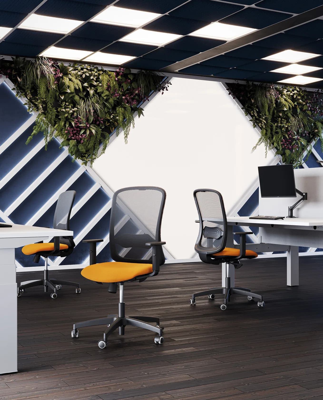 Tre sedute V-Ray con schienale in rete nera e sedile arancione, braccioli e base nera, in ufficio con pareti verdi.